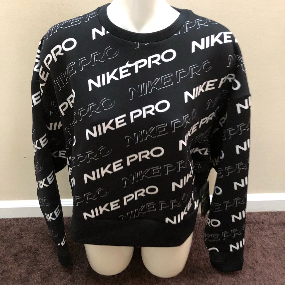 Nike size med. Crop sweat shirt. Black/white. New with tags. Polyester/spandex.